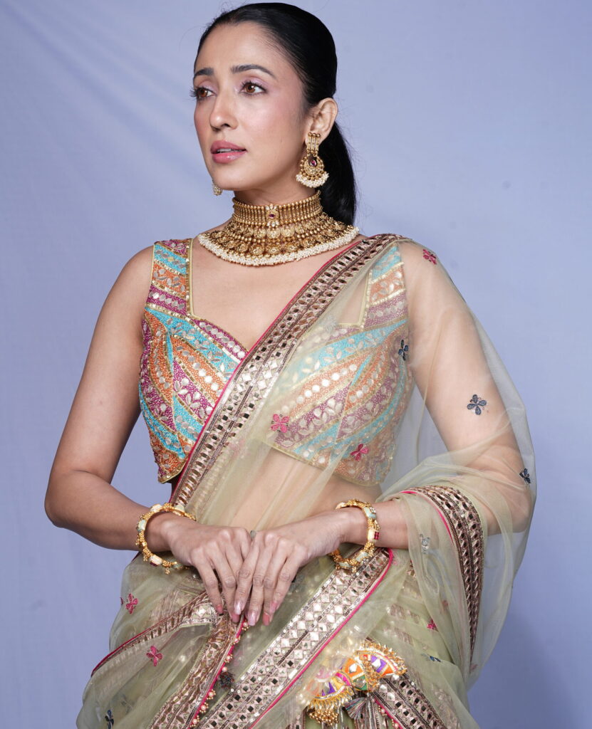 Pastel Multi-Color Mirror Embroidered Lehenga Set with Net Dupatta